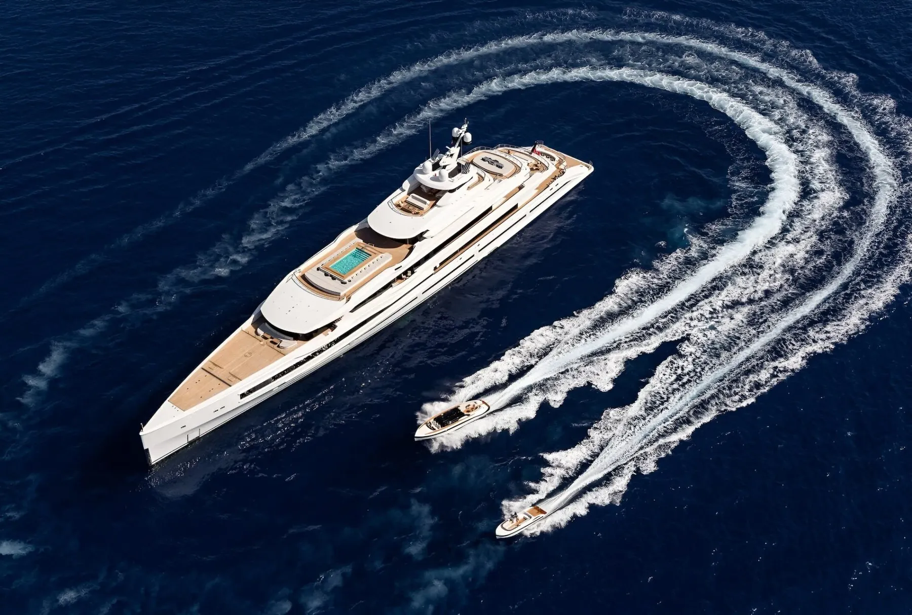 Superyacht turning at speed, aerial