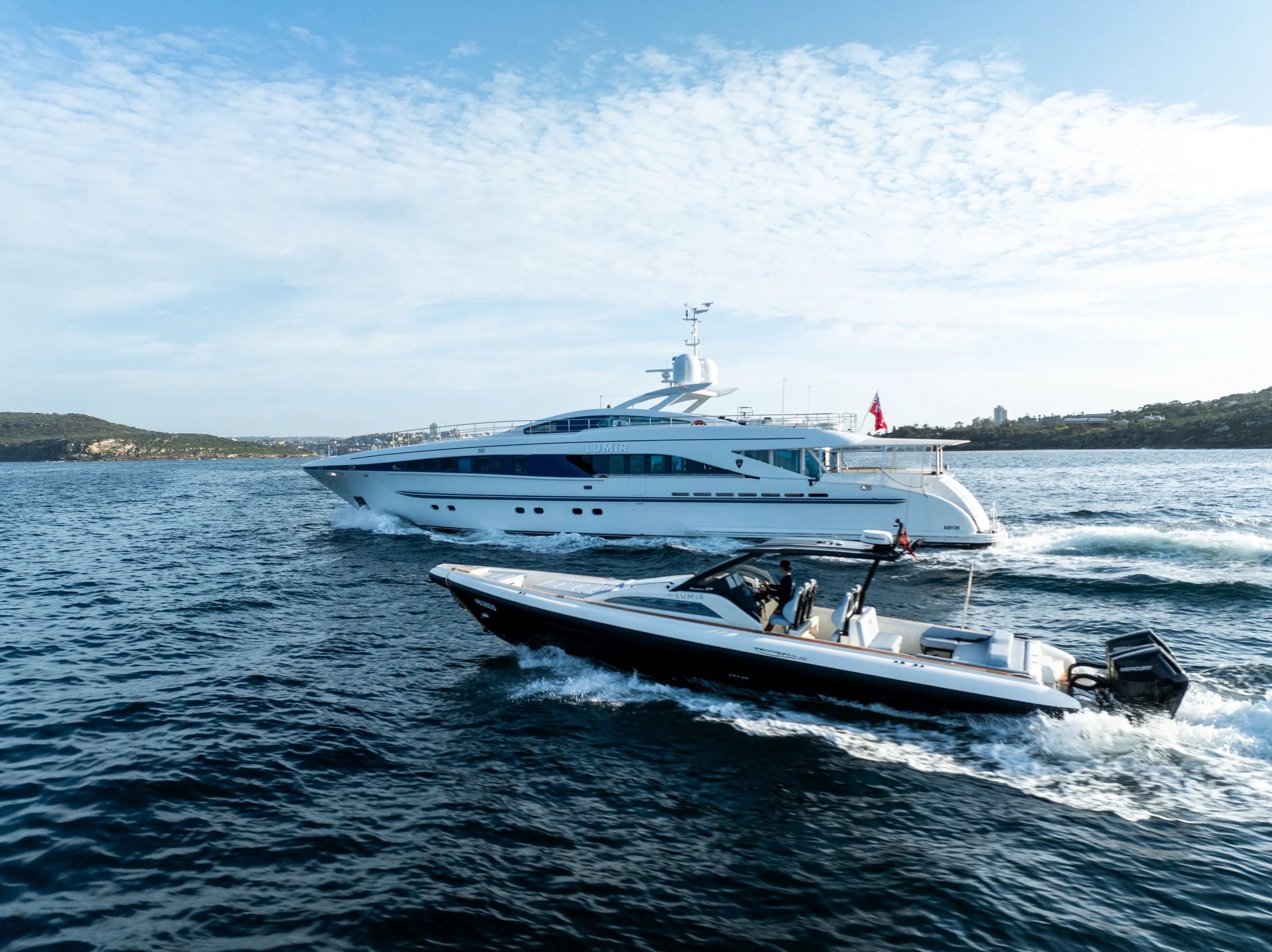 M/Y Lumir under way with her Technohull tender alongside